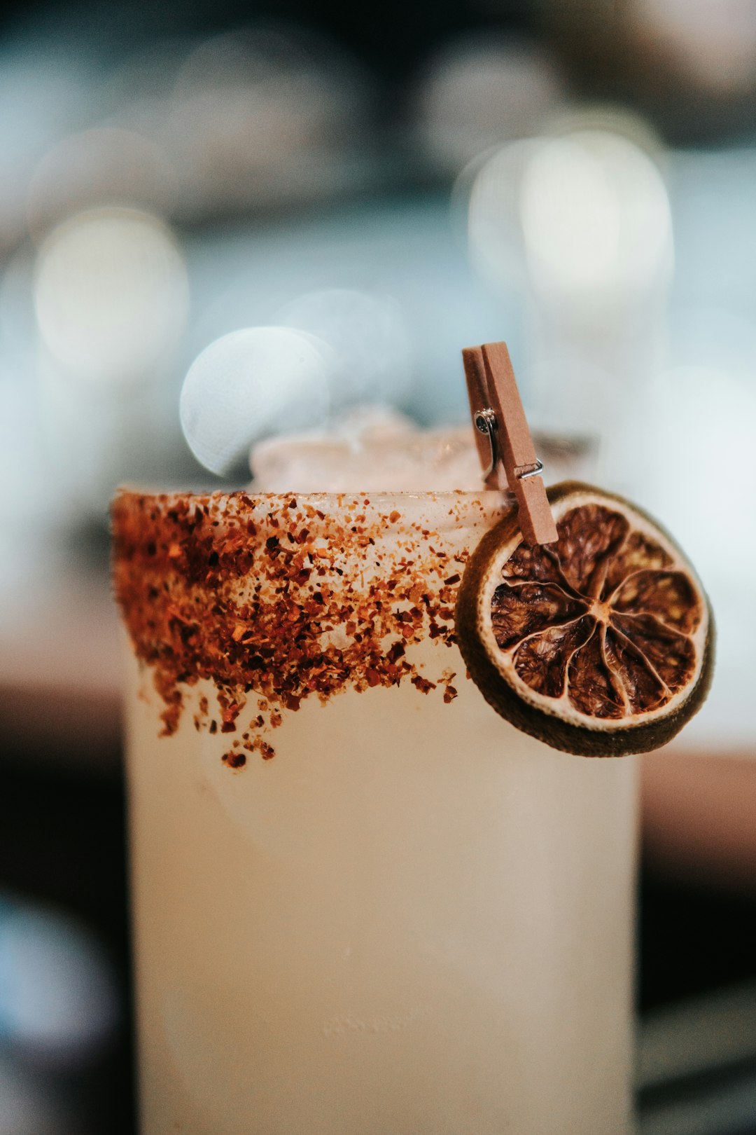 Craft cocktail with dried citrus garnish